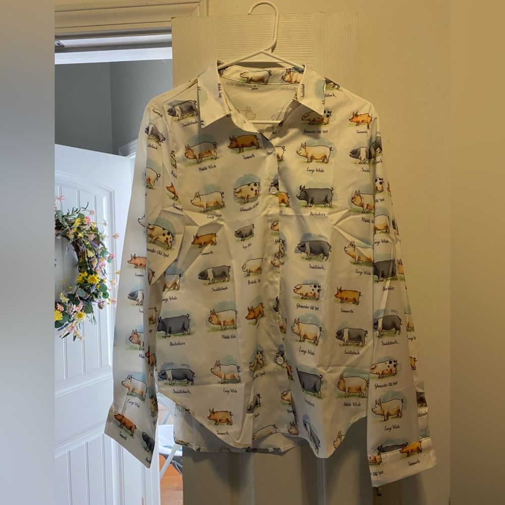 Collared shirt with pig design
